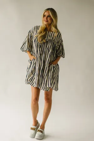 The Pampa Bubble Sleeve Babydoll Dress in Navy Stripe